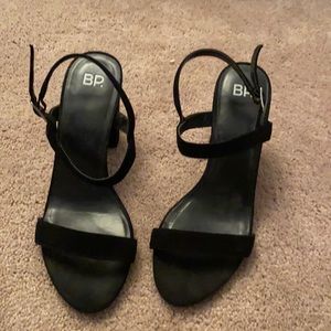 Black suede sandals with a heel